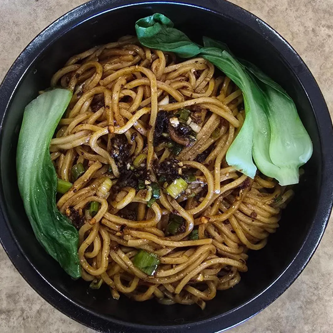 Spicy noodles with bok choy at Sweet Crisp Duck, a Chinese Restaurant in Newark